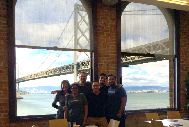 Lori with her learning team in San Francisco in front of the Bay Bridge