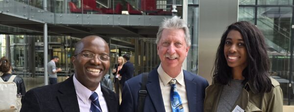 Dr. Bukhosi Dube, WG’24, Dr. Cynthia Obiozor, WG’24, and Penn Medicine Prof. Bruce Levine at the World Cancer Congress in Geneva (Credit: Denis Migliorini, MD)