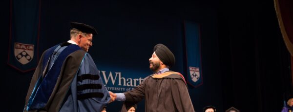 Guljot Grover, WG’16, at Wharton’s graduation with Dean Geoffrey Garrett. (Image Credit: Gaurav Gupta)