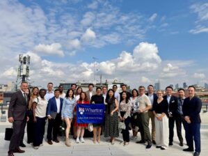 Caption: Parashar Saikia with classmates on the rooftop at Buccellati in Milan. (Image Credit: Meg Chiodo)